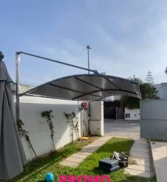 Carport motorisé — résidence