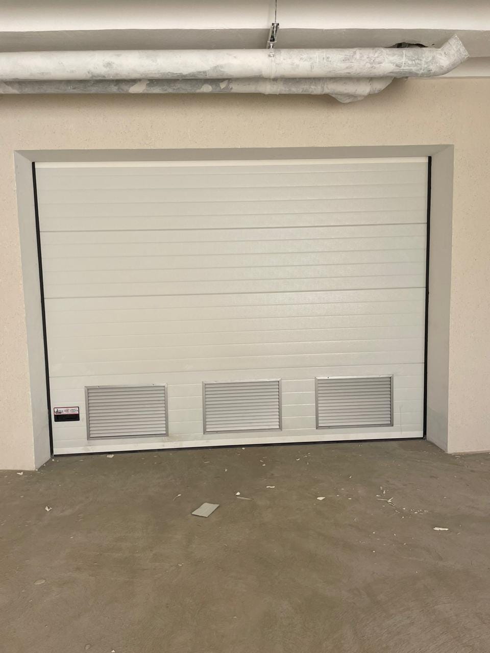 Porte de garage sectionnelle — villa — 2